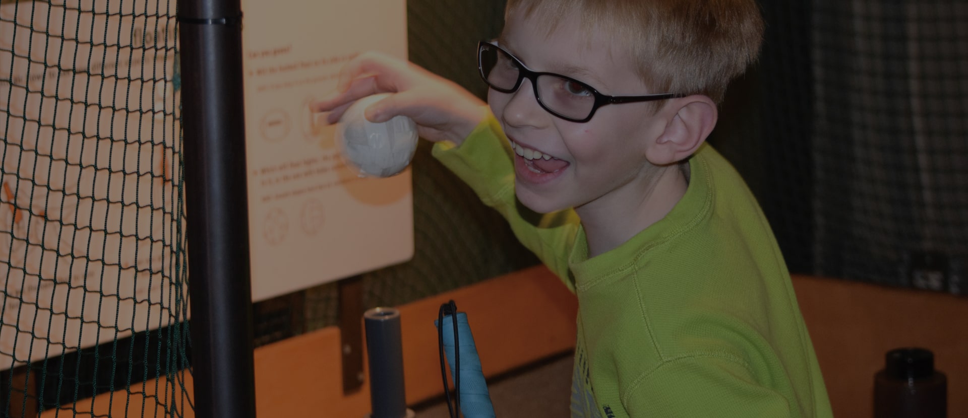 Picture of a smiling kid with cane.